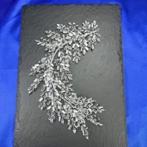 Diamond-encrusted waterfall tassel headband, sparkling crystal dangling headpiece, perfect for formal occasions.